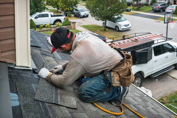Professional Roofing technician working in De Borgia, MT